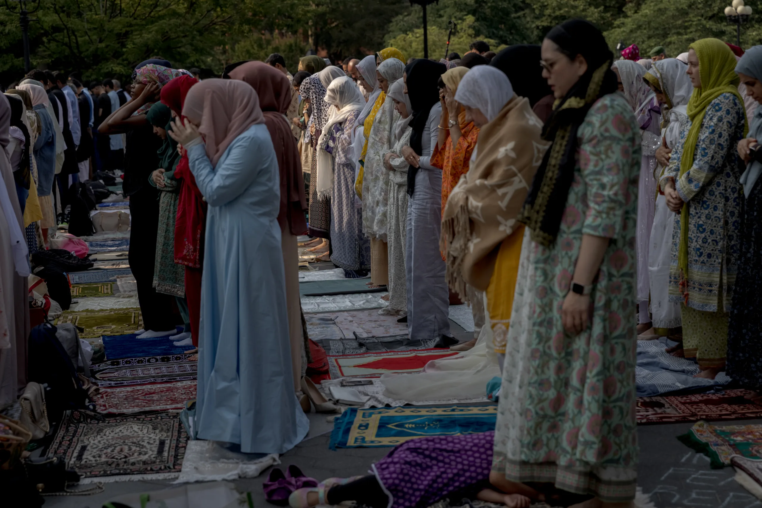 Thousands come together for Eid al-Adha prayers in New York City's Washington Square Park.