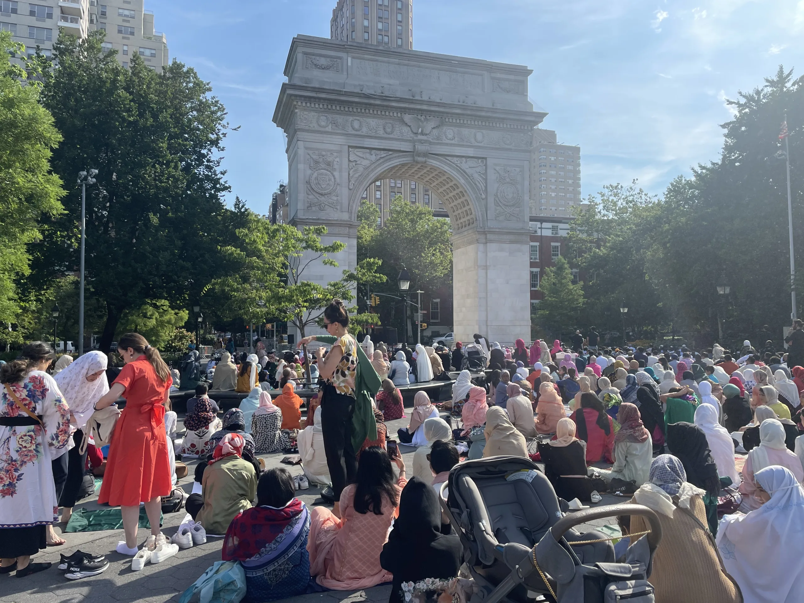 Muslim New Yorkers gather in prayer in Washington Square Park to celebrate Eid.
