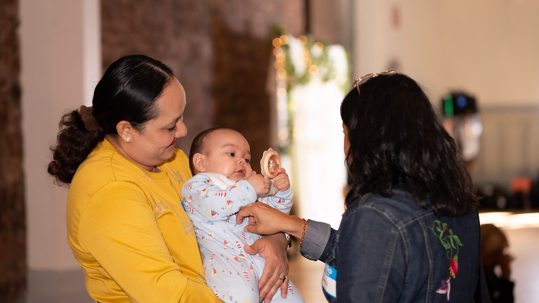 New Mothers Find Community Far From Home